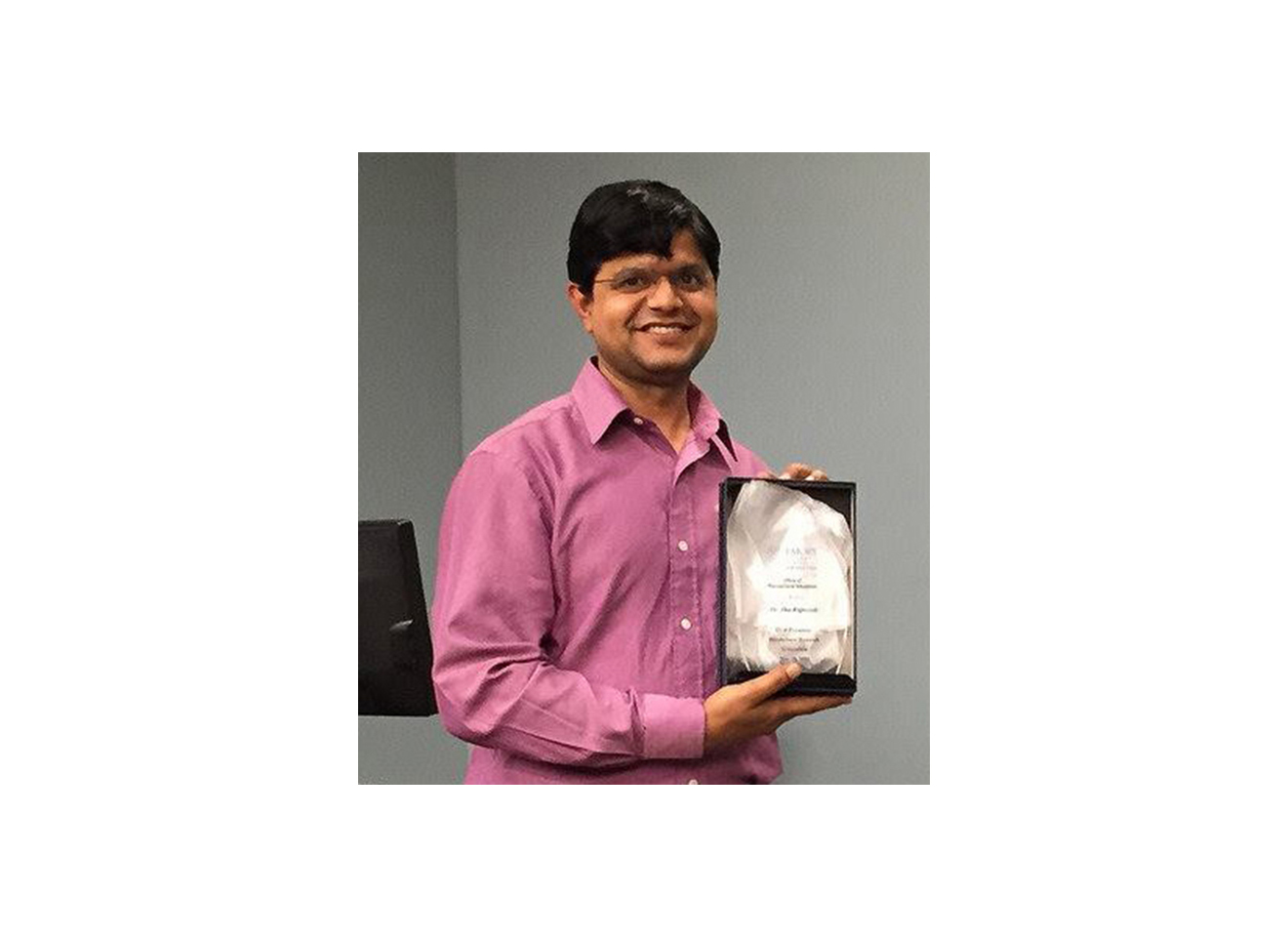 Dr. Rajneesh Jha won the Oral Presentation Award Carousel Photo